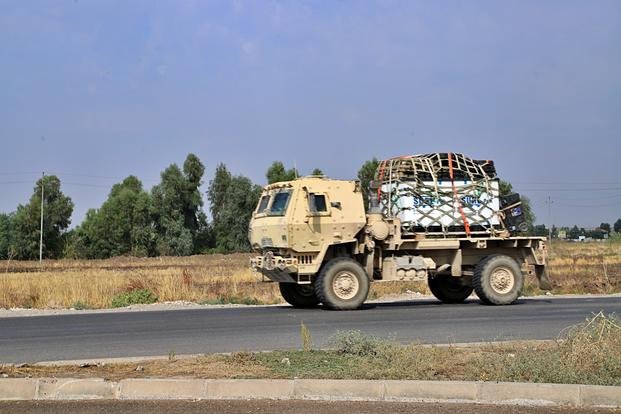 U.S. military vehicle, part of a convoy, arrives near Dahuk, Iraq