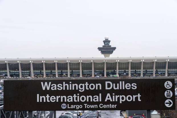 A sign for the Washington Dulles International Airport station is seen during the opening of the new Silver Line Extension at Washington Dulles International Airport in Chantilly, Va.