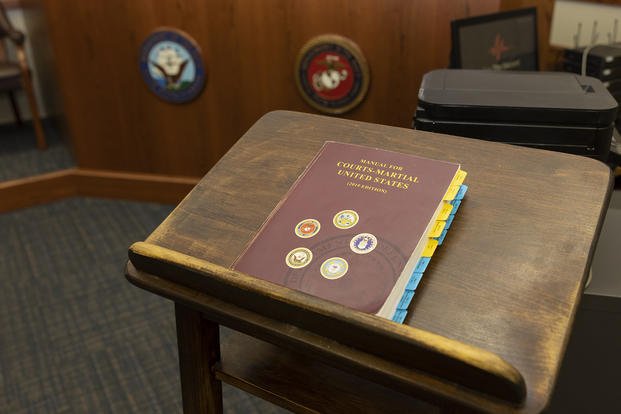 The 2019 edition of the Manual for Courts-Martial United States rests on a podium in the courtroom at Marine Corps Air Station Yuma, Arizona.