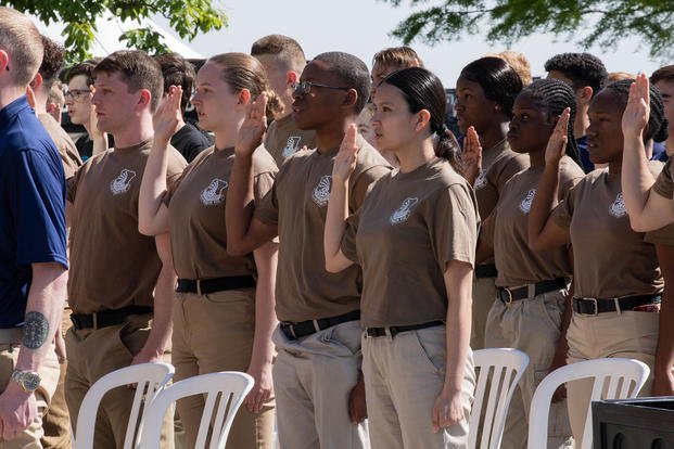 Enlistees of all service branches swore their ‘Oath of Enlistment’ at the Indianapolis Motor Speedway.
