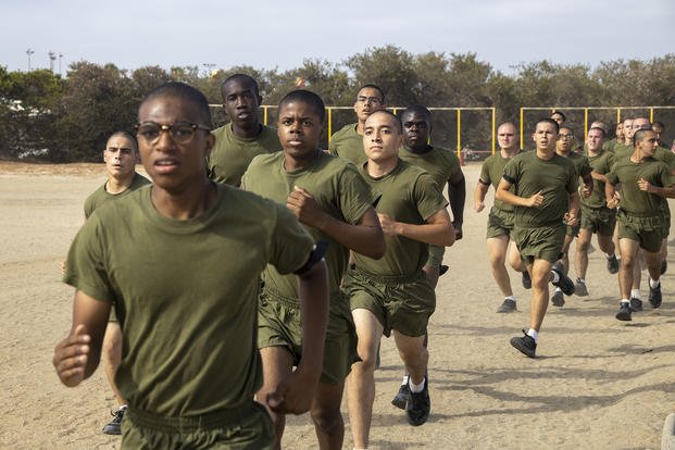 U.S. Marine Corps recruits with Bravo Company, 1st Recruit Training Battalion, run during a physical training session at Marine Corps Recruit Depot San Diego.