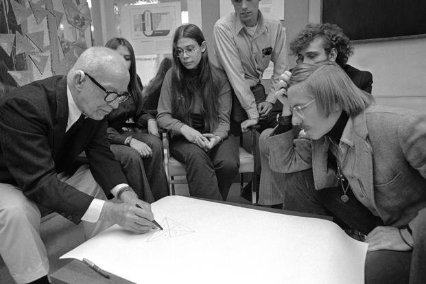 Buckminster Fuller, shown with a group of students just off campus from Southern Illinois University, is an inventor and author of the book ‘Operating Manual for Spaceship Earth.’ 