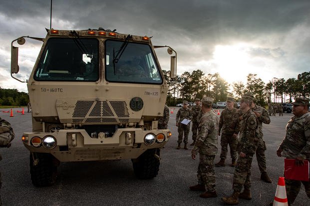Soldiers of the Florida Army National Guard’s 160th Transportation Company, 254th Transportation Battalion, 50th Regional Support Group, review convoy inspection standards at Camp Blanding, Florida.