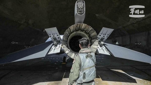 A pilot checks on a F-16s at Hualien Airbase in Taiwan