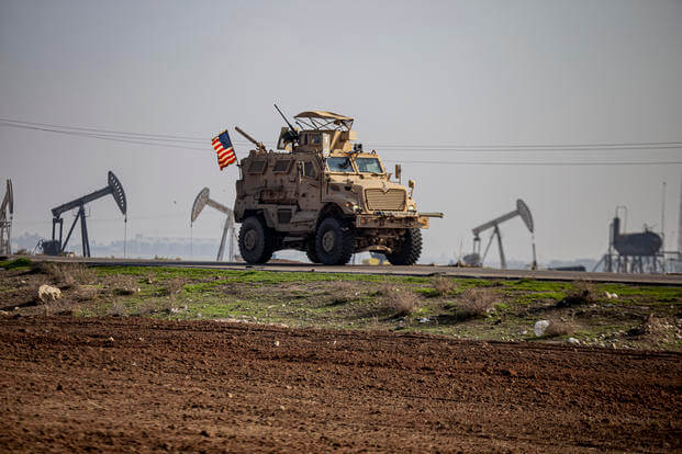 A U.S. military vehicle on a patrol in the countryside near the town of Qamishli, Syria