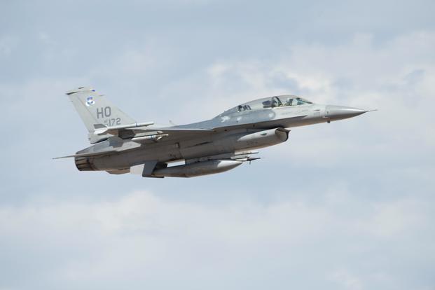 An F-16 Viper assigned to the 311th Fighter Squadron, takes off from Holloman Air Force Base, N.M, July 27, 2020.