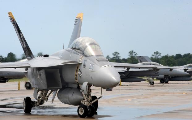 A U.S. Navy F/A-18F Super Hornet aircraft assigned to Strike Fighter Squadron (VFA) 103 sits on the flight line at Naval Air Station Oceana, Va., July 29, 2009.