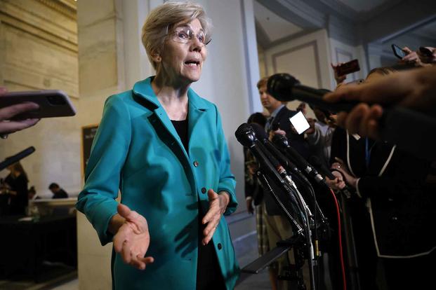 Sen. Elizabeth Warren talks to reporters