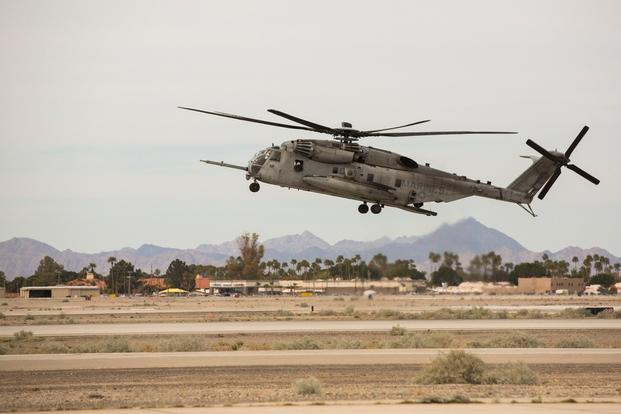 U.S. Marines stationed at Marine Corps Air Station (MCAS) Yuma simulate combat maneuvers upon exiting a CH-53 Super Stallion during the 2019 Yuma Airshow, March 9, 2019. 