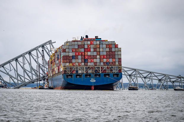 The container ship Dali is seen in the wreckage of Francis Scott Key Bridge almost a week after it hit a structural pier, causing a subsequent bridge collapse.