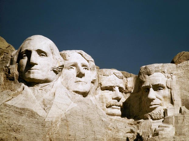 The images of, from left, former presidents George Washington, Thomas Jefferson, Theodore Roosevelt and Abraham Lincoln are shown on Mount Rushmore in South Dakota.