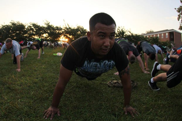 A Marine does push-ups during Headquarters and Support Battalion's monthly physical training aboard Marine Corps Base Camp Lejeune, N.C.