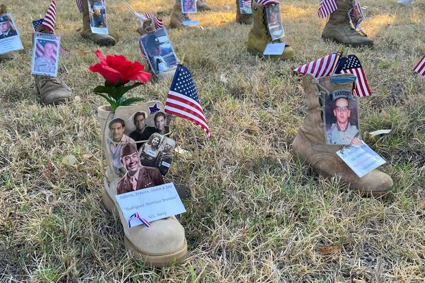 Combat boots decorated and displayed at Annual Fallen Hero Run