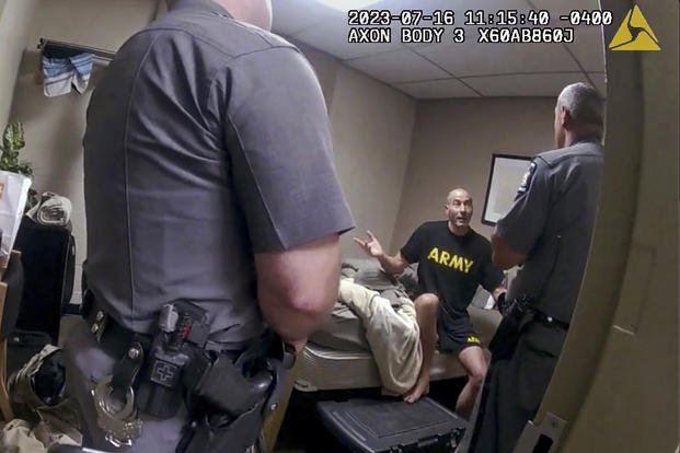 In this image taken from New York State Police body camera video that was obtained by WMTW-TV 8 in Portland, Maine, New York State Police interview Army reservist Robert Card, the man responsible for Maine's deadliest mass shooting, at Camp Smith in Cortlandt, N.Y.