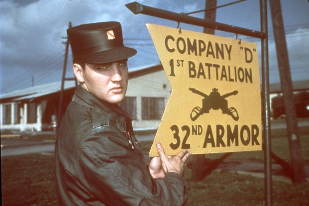 Elvis Presley is shown in uniform at Company D, 1st Battalion, 32nd U.S. Army Armour at the barracks area in Friedberg, Germany, 1958. 