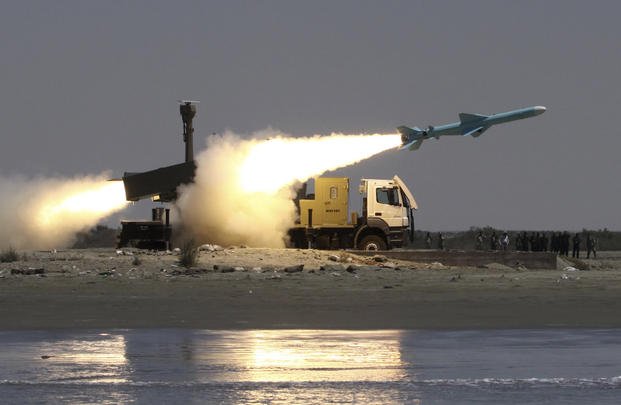 Noor missile is launched from the coast to the sea during Iranian naval maneuvers in the Oman Sea