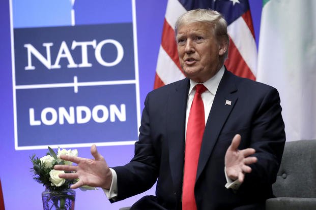 President Donald Trump speaks during the NATO summit