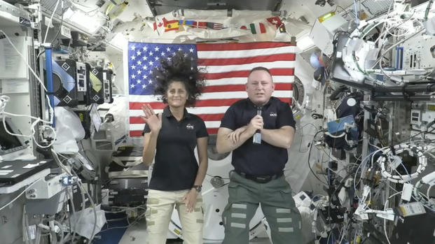 astronauts Suni Williams, left, and Butch Wilmore give a news conference