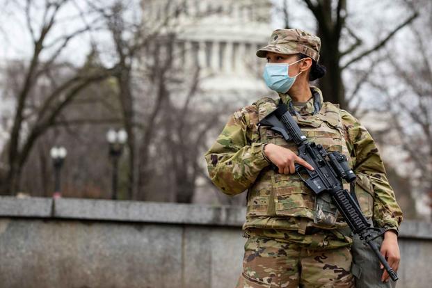 U.S. Army medic stands watch near the U.S. Capitol