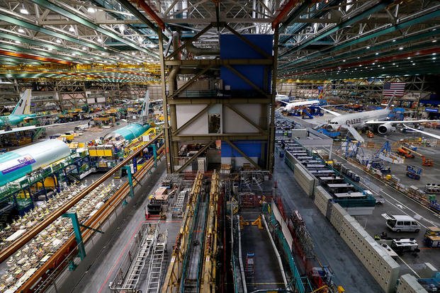 The 777 factory line, left, is seen next to the 787 line at Boeing’s Everett Production Facility