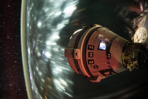 Boeing’s Starliner spacecraft is pictured docked to the International Space Station’s Harmony module forward port.