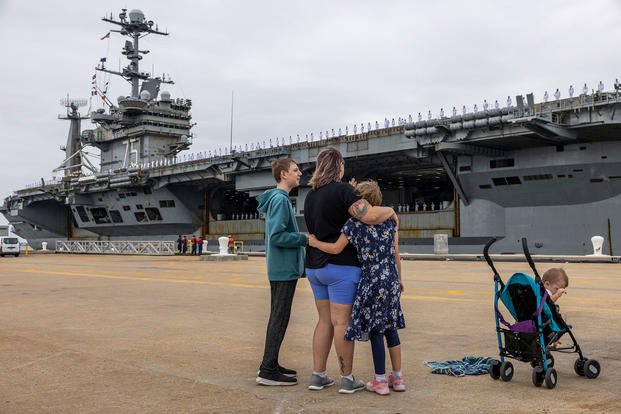 The Gossett family watches as the USS Harry S. Truman deploys from Naval Station Norfolk