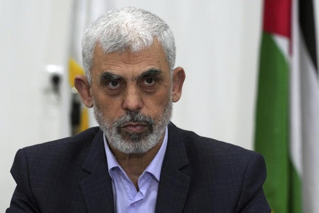 Yahya Sinwar, head of Hamas in Gaza, chairs a meeting with leaders of Palestinian factions at his office in Gaza City