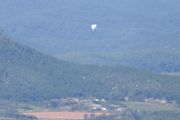 North Korean balloons are seen from the Unification Observation Post in Paju, South Korea