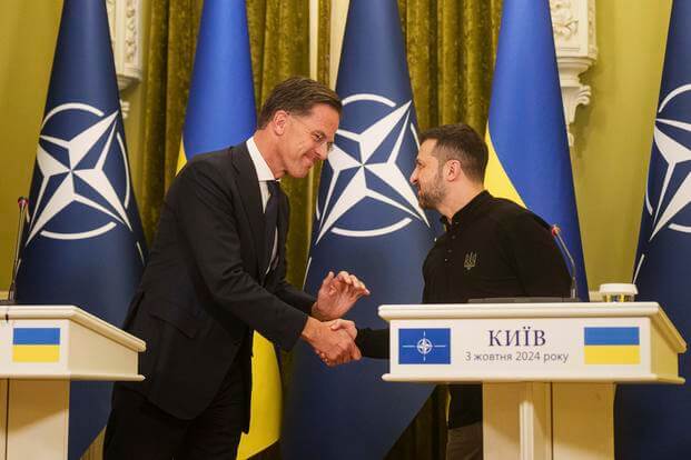 NATO Secretary General Mark Rutte, left, and Ukrainian President Volodymyr Zelenskyy