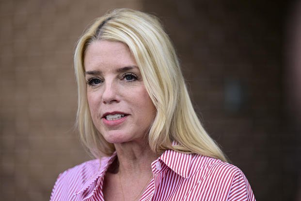 Pam Bondi, former Florida Attorney General, speaks to reporters outside an election integrity volunteer training