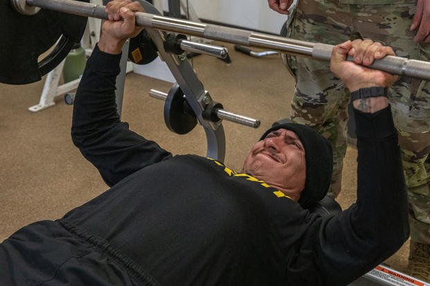 Spc. Eduardo Medina-Mendoza, with 48th Ordnance Group, performs a bench press during a tactical athlete assessment at Camp Navajo in Bellemont, Ariz.