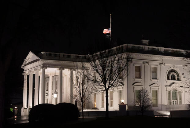 The flag flies at half-staff at the White House.
