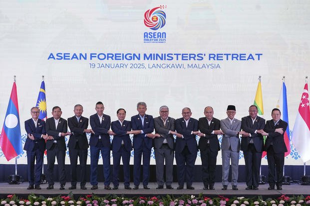 Asia leaders pose for a group photo