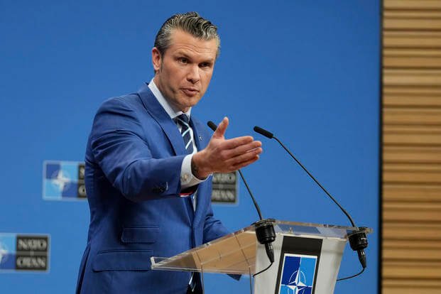 Defense Secretary Pete Hegseth speaks during a media conference at NATO headquarters