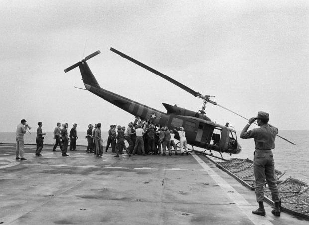 Helicopter aboard the USS Blue Ridge pushed into the sea off the coast of Vietnam 