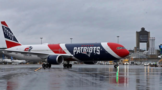 The New England Patriots football team's jet taxis on the tarmac, Thursday, April 2, 2020, at Logan Airport