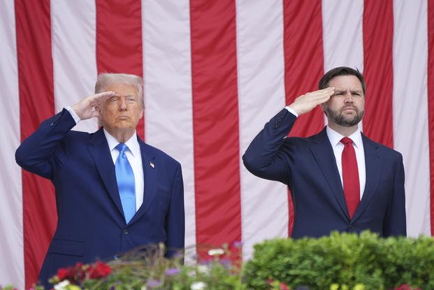 President Donald Trump and Vice President JD Vance salute at the National Memorial Day Observance