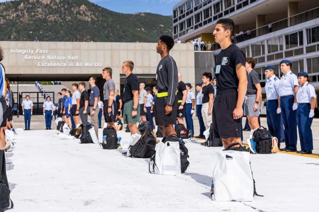 Basic cadet candidates from the class of 2029 arrive at the U.S. Air Force Academy for in-processing
