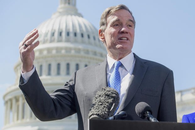 Sen. Mark Warner, D-Va., speaks during a news conference at the Capitol