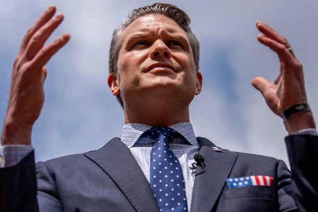 Defense Secretary Pete Hegseth speaks to reporters at the Pentagon, July 16, 2025, in Washington. (Julia Demaree Nikhinson/AP File Photo) Pentagon Commaders Meeting