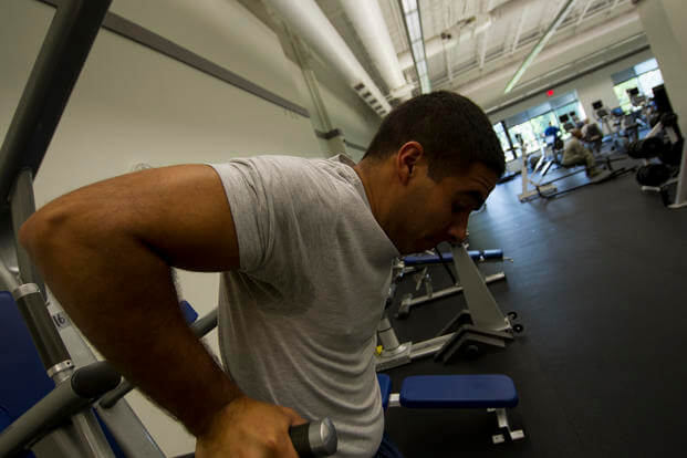 Senior airman Jared Trimarchi completes a set of dips at Joint Base Charleston, S.C.