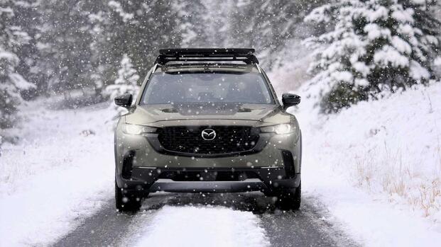 2025 Mazda CX-50 Turbo Meridian Edition Bronze Front Snow Driving