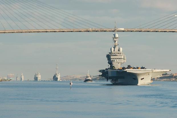 The French navy nuclear aircraft carrier Charles de Gaulle (R91) transits the Suez Canal as it enters the U.S. 5th Fleet area of operations. (Official French navy photo/Released)