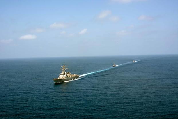 The guided-missile destroyer USS Mason (DDG 87) conducts formation exercises with two Cyclone-class patrol craft, the USS Tempest (PC 2) and USS Squall (PC 7) on Sept. 10, 2016, in the Arabian Sea. (U.S. Navy photo/Janweb B. Lagazo)