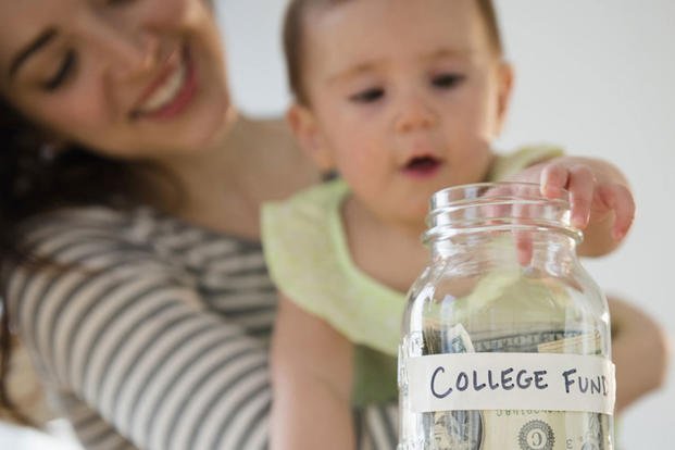 Mom and baby with college fund jar