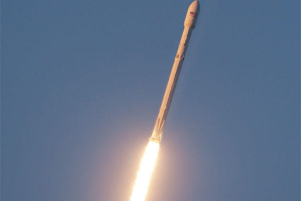 A Falcon 9 SpaceX rocket lifts off from launch complex 40 at the Cape Canaveral Air Force Station in Cape Canaveral, Fla., Wednesday, Feb. 11, 2015. (AP Photo/John Raoux)