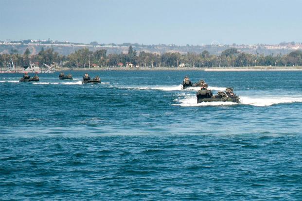 U.S. Marines in amphibious assault vehicles, attached to 3rd Amphibious Assault Battalion’s Bravo Company, transit to Mexican Navy’s ARM Usumacinta as part of AAV operation training during RIMPAC 2016. (Photo: Petty Officer 2nd Class Molly Sonnier)