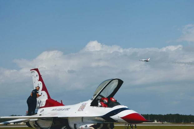 Maintenance crews work on the Thunderbirds as some conduct routine flyovers before a public airshow at Tyndall April 22. (Photo: Oriana Pawlyk) 