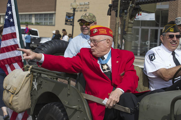 Hershel “Woody” Williams greets people from Gainesville, Texas, during the Medal of Honor Parade, April 11, 2015. (U.S. Air Force photo by Senior Airman Kyle Gese)
