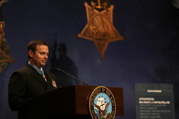 Senior Chief Special Warfare Operator (SEAL) Edward C. Byers Jr. delivers remarks during his Hall of Heroes induction ceremony. (U.S. Navy photo by Oscar Sosa/Released)